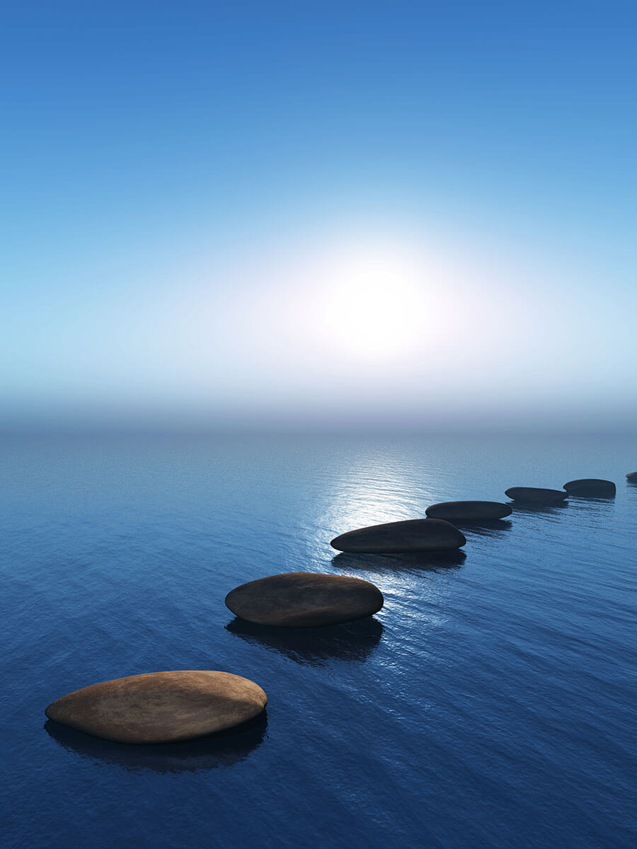 Stones spaced far apart representing the appearance of being withdrawn and uncomfortable